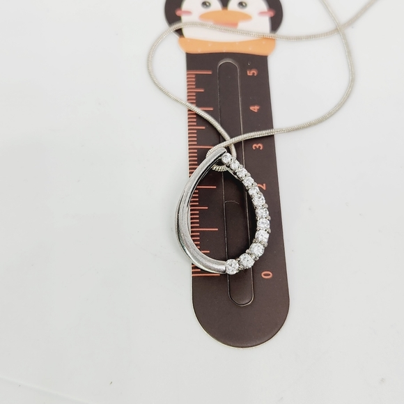 Silver Tone Graduated Cubic Zirconia Open Teardrop Pear Journey Necklace - Picture 6 of 6